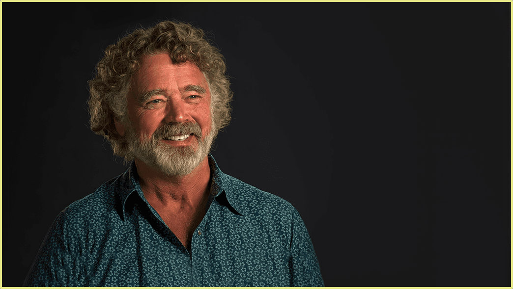 Headshot of John Schneider